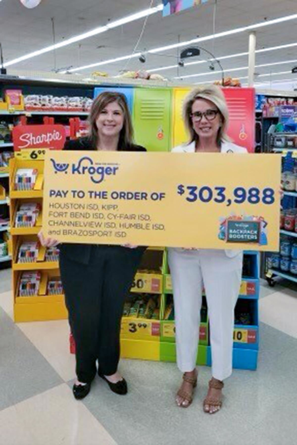 CFISD Director of Community Engagement Dawn Tryon, right, poses with Liz Colvin, vice president of Kroger Houston.